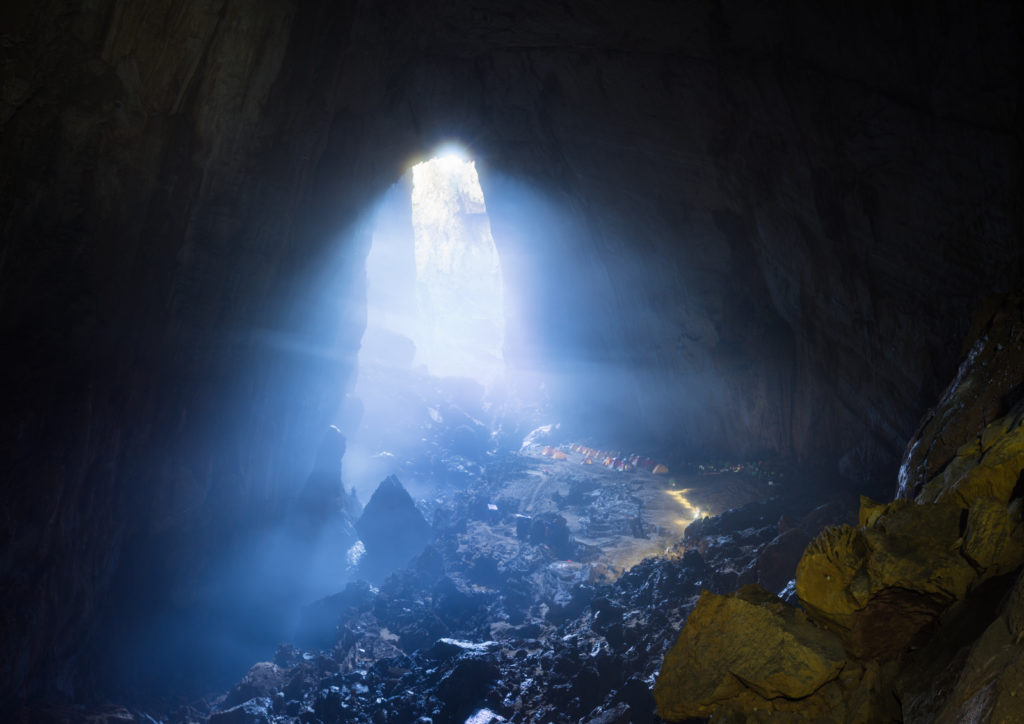 Valentine's Day Vacation Ideas - Mystery misty cave entrance in Son Doong Cave, the largest cave in the world in UNESCO World Heritage Site Phong Nha-Ke Bang National Park, Quang Binh province, Vietnam