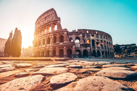 The ancient Colosseum in Rome at sunset - Flying from the US to Rome