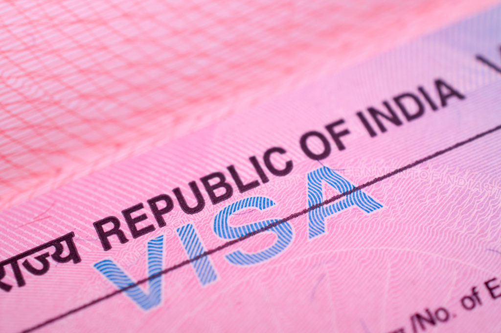 Get an E-visa and you won't need to get a visa in your passport when you travel to India